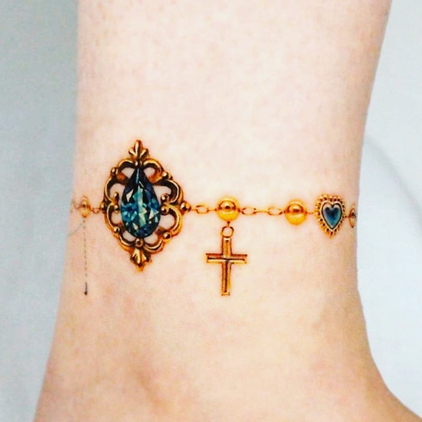Gold Rosary Tattoo