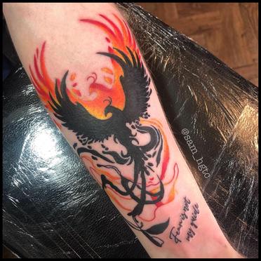 phoenix rebirth from ashes tattoo
