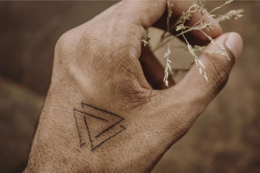 Double Triangle Tattoo: Meaning And Symbolism