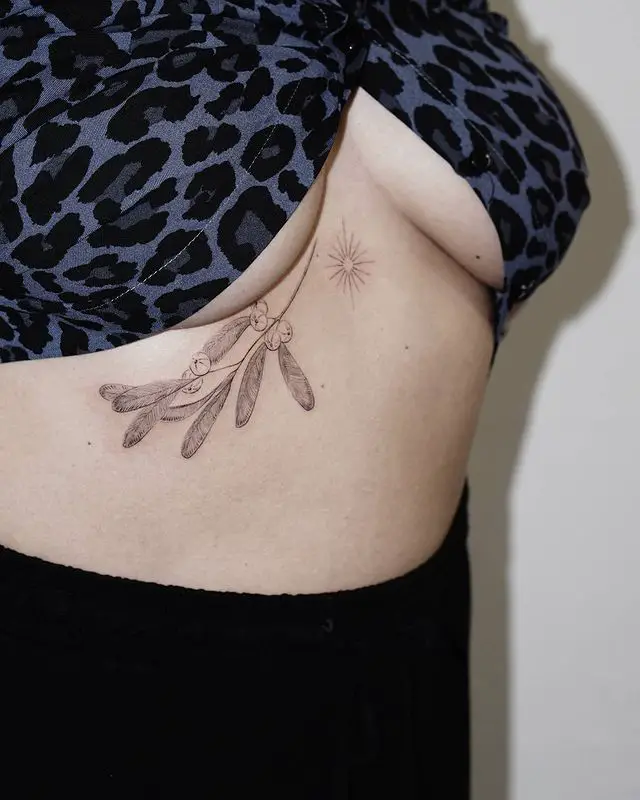Mistletoe Underboob Tattoo