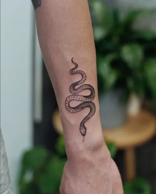 Black and white Wrist snake tattoos