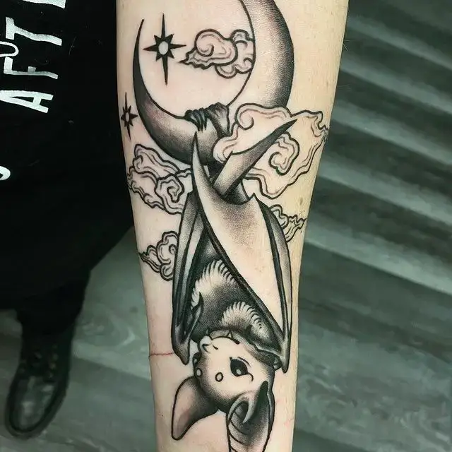 Black ink bat tattoo