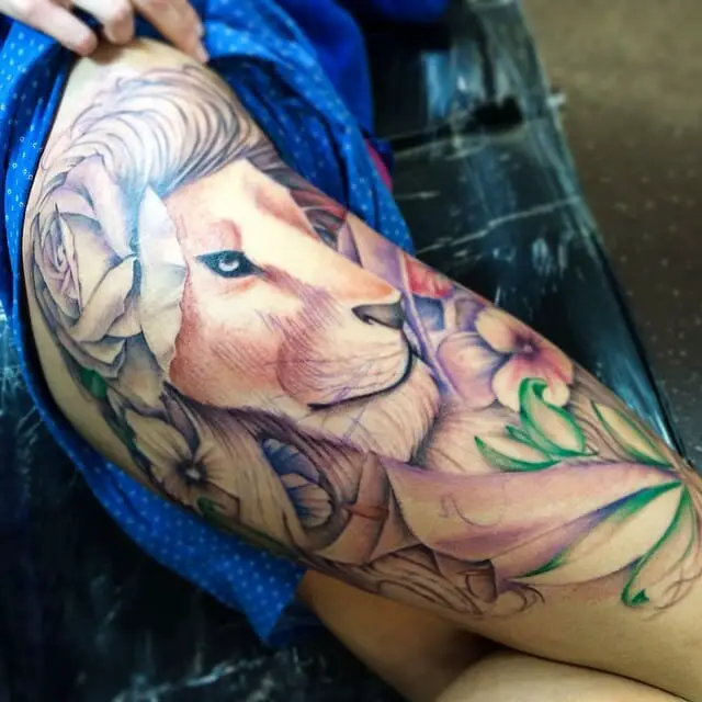 Colored Lion Tattoo On Thigh