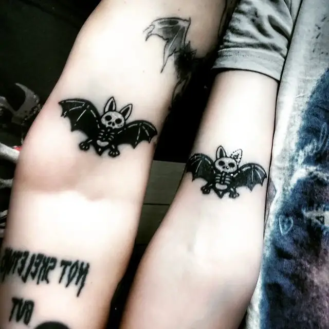 Couple bat tattoo