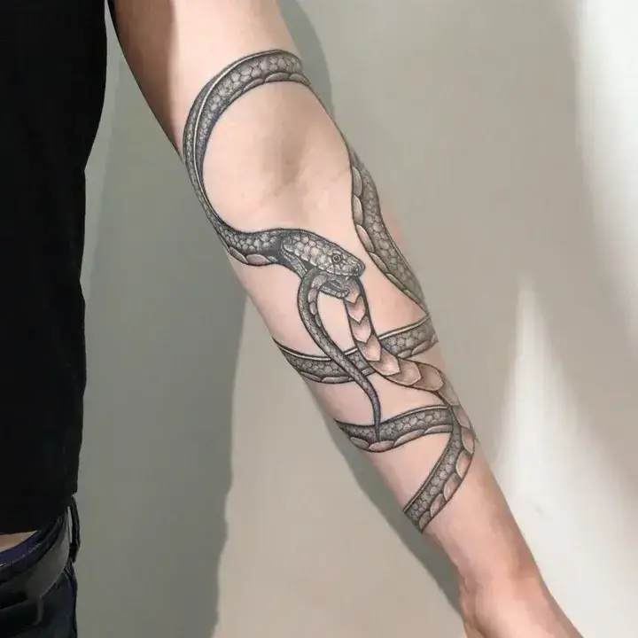 Hand Poked Small Snake Tattoo