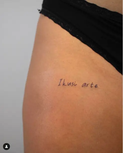 Ikushi Arte Wording tattoo for thigh