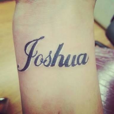 Joshua Name tattoos on wrist