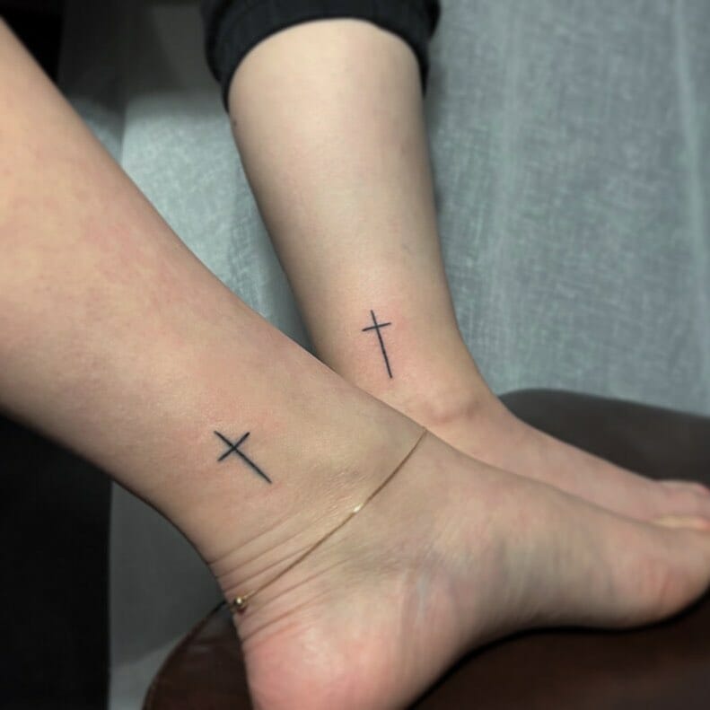 Cross tattoo on ankle