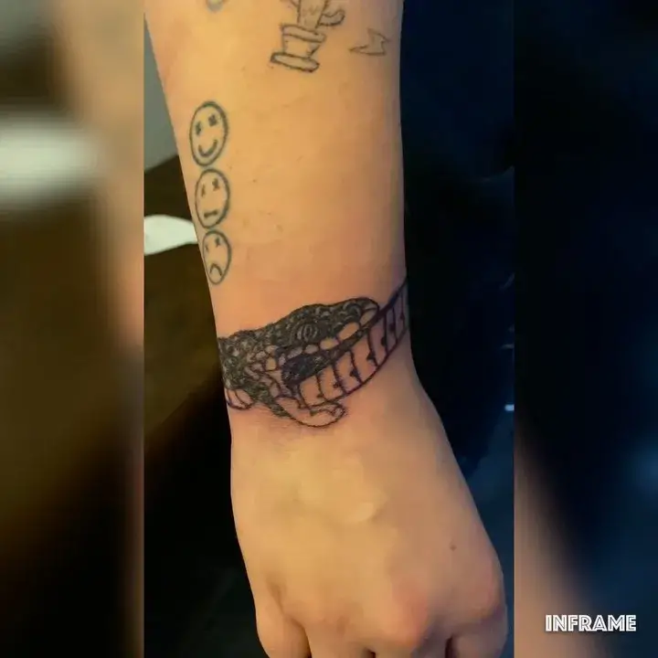 Snake Eating Itself Tattoo