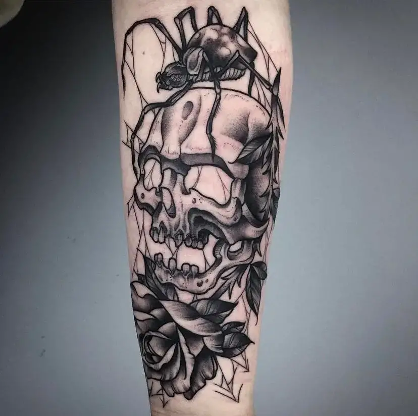 Spider and skull tattoo