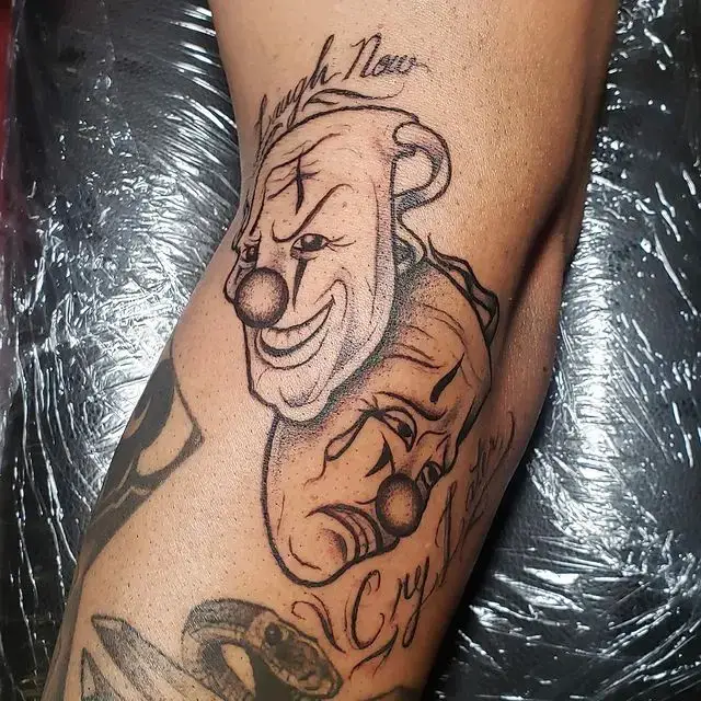 carrying the weeping face tattoo