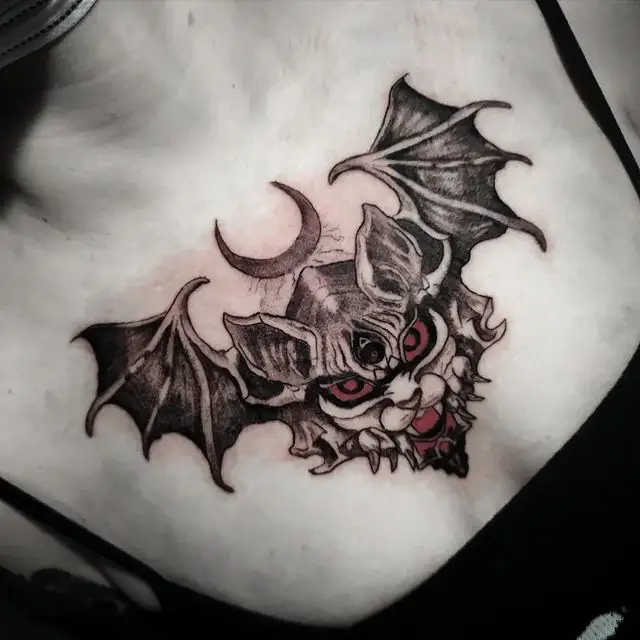 Red eye bat tattoo