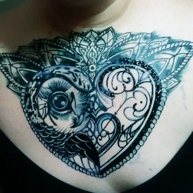 Blue Owl And Heart Tattoo On Chest For Men
