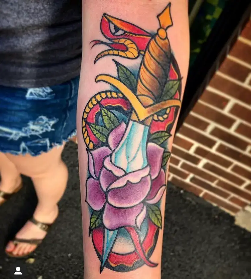 Snake and dagger tattoo