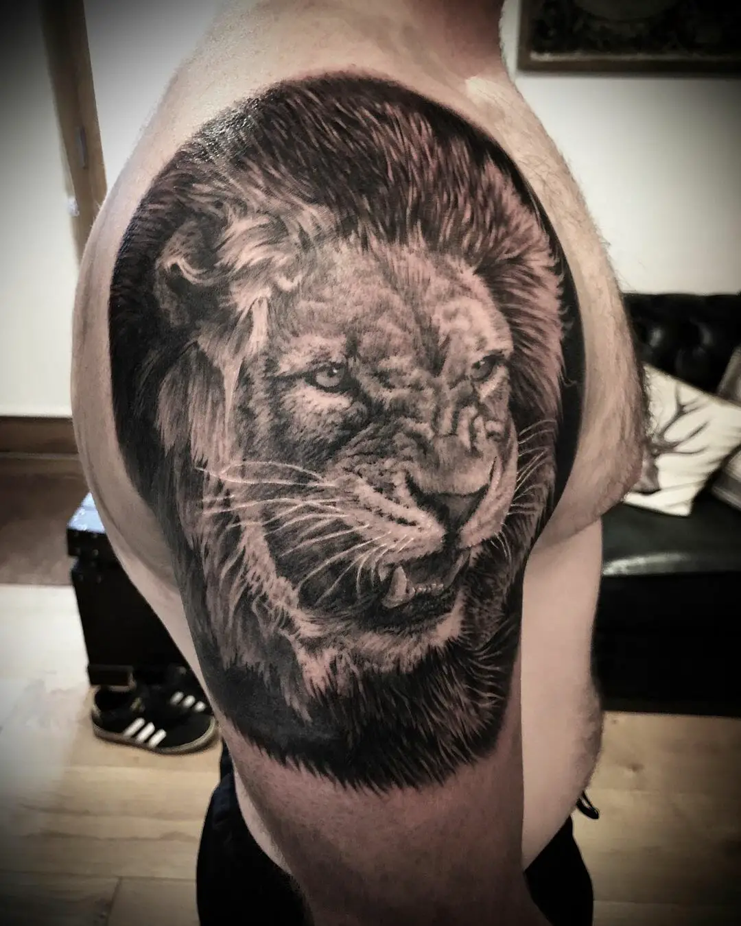 lion shoulder tattoo