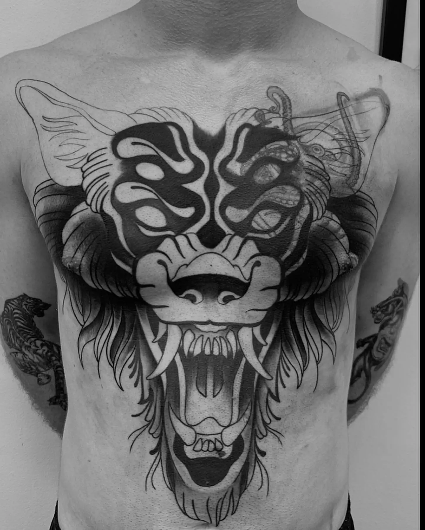 Wolf tattoo on chest