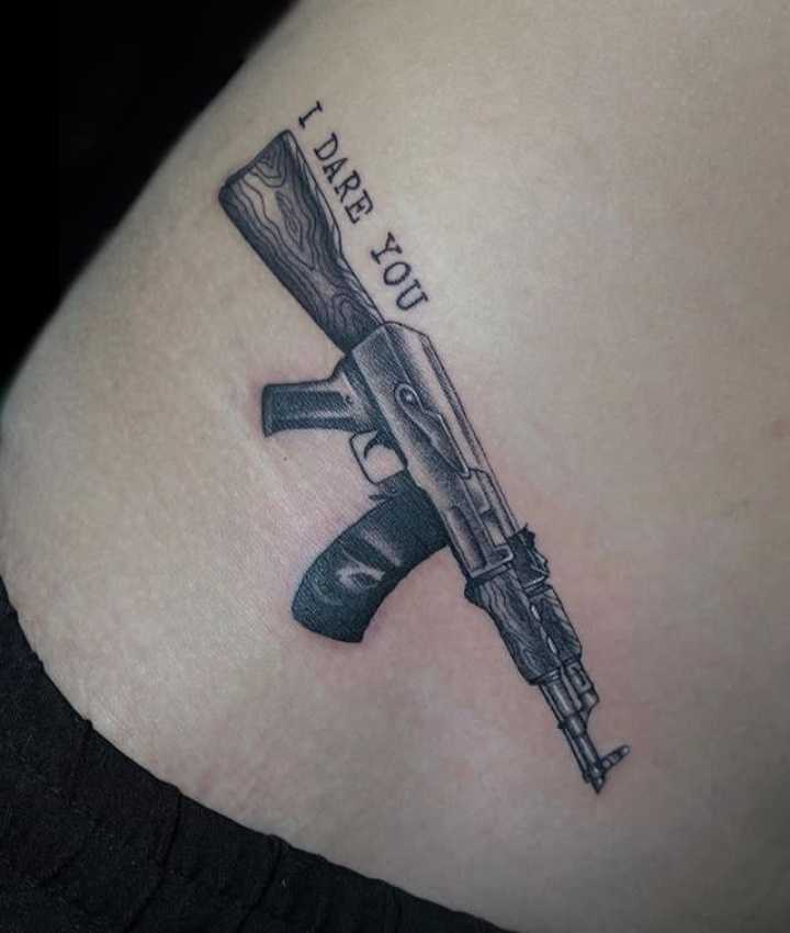 I Dare You Gun Tattoo On Waist