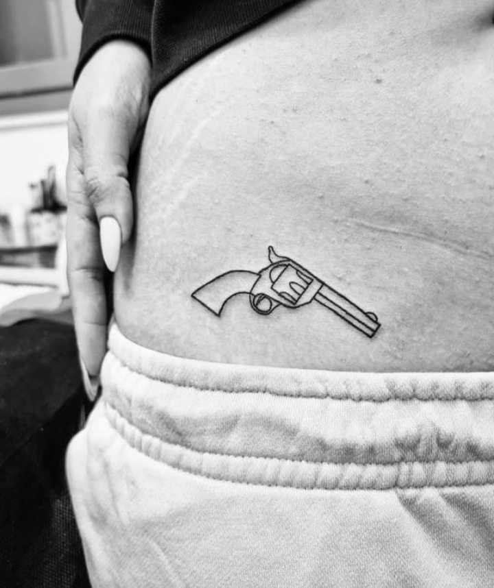 Pistol Tattoo on Waist