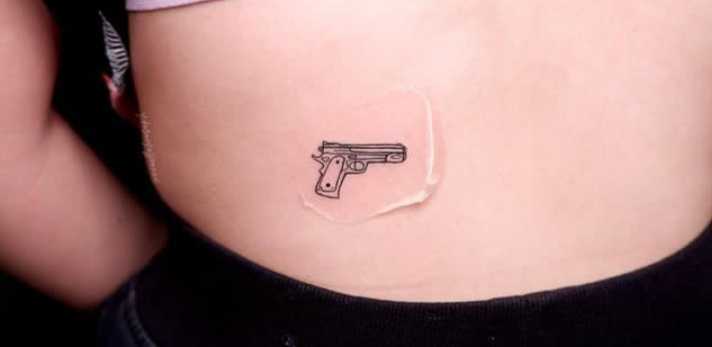 Minimal Gun Tattoo