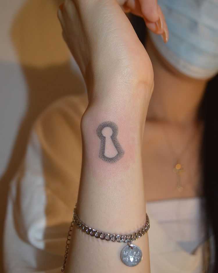 Outlined KeyHole Tattoo
