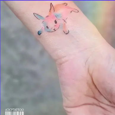 bunny tattoo on wrist