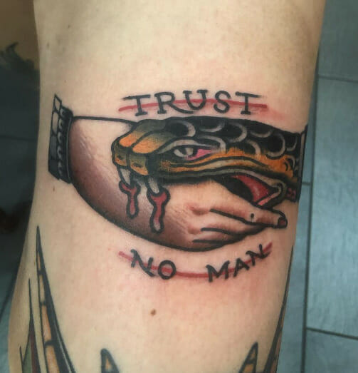 39 Statement Making “Trust No Man” Tattoo Designs - Psycho Tats